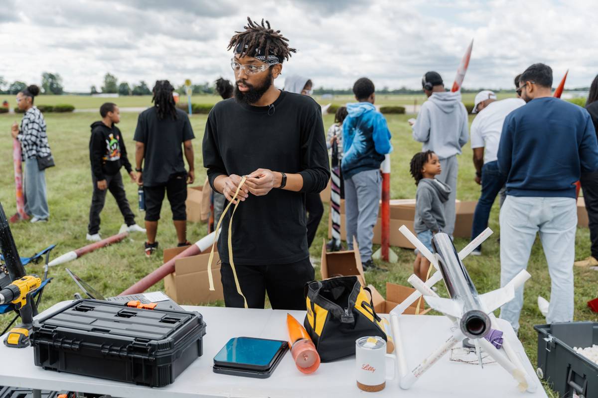 Tanaka Chonyera preparing igniters at the field prep station